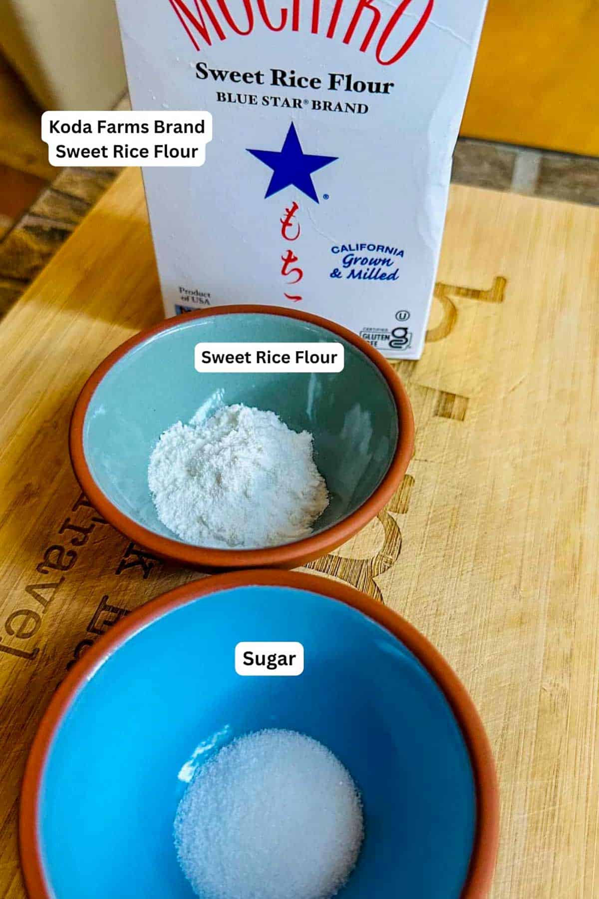 A box of sweet rice flour, and bowls containing sweet rice flour and sugar.